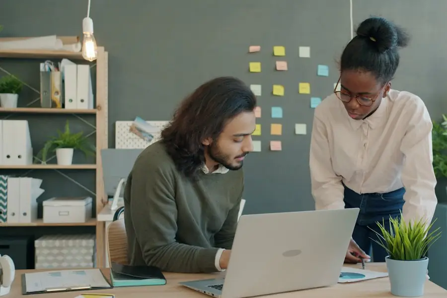 IT professionals working on laptops